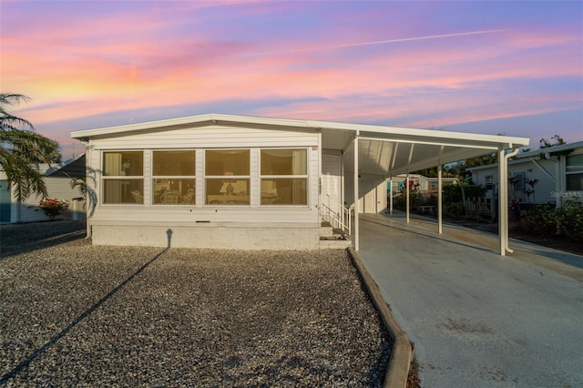 view of front facade featuring a carport