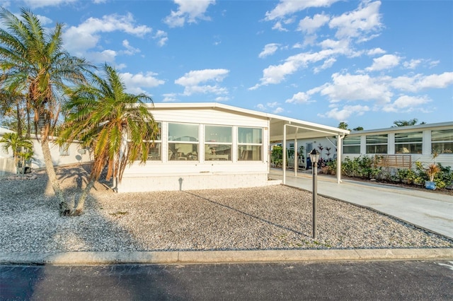 manufactured / mobile home featuring a carport