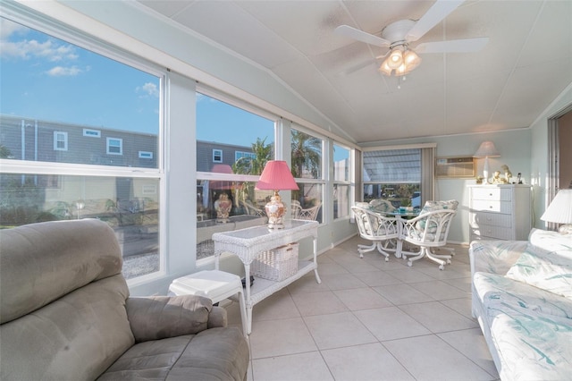 sunroom / solarium with ceiling fan, a wall unit AC, and vaulted ceiling