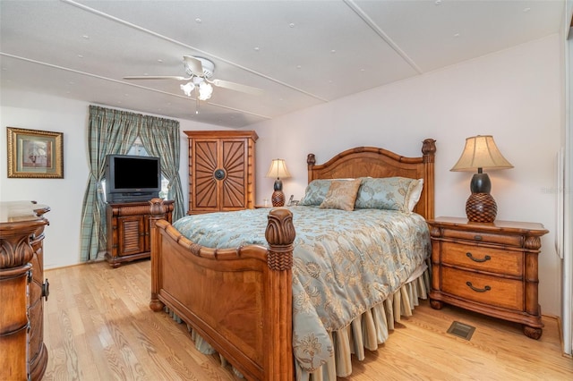 bedroom featuring ceiling fan and light hardwood / wood-style floors