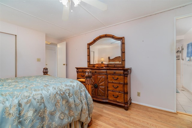 bedroom featuring ceiling fan and light hardwood / wood-style floors