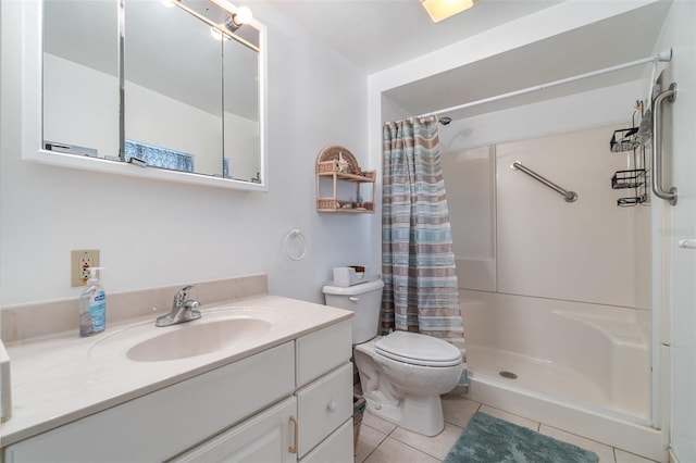 bathroom featuring toilet, tile patterned floors, vanity, and a shower with curtain