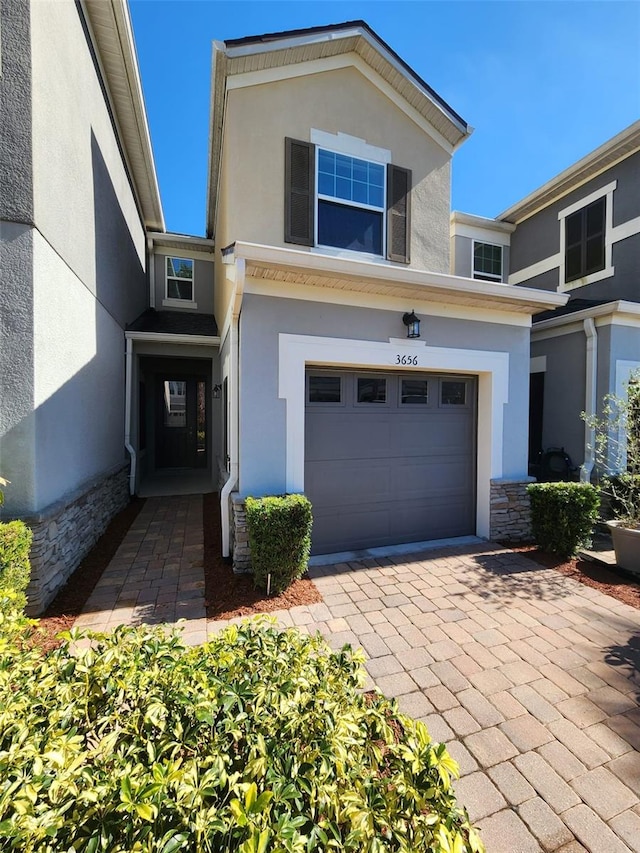 view of front of home with a garage