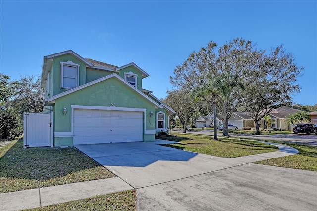 exterior space with a front lawn and a garage