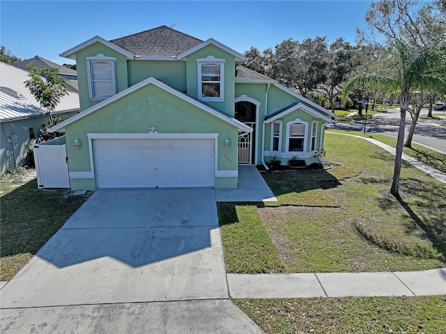 front facade with a garage and a front yard