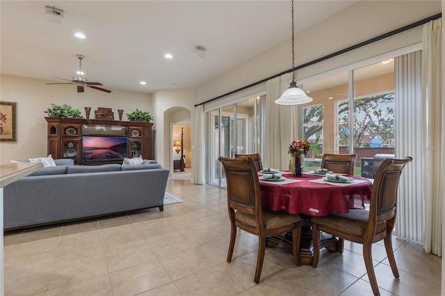 dining area featuring light tile patterned flooring and ceiling fan