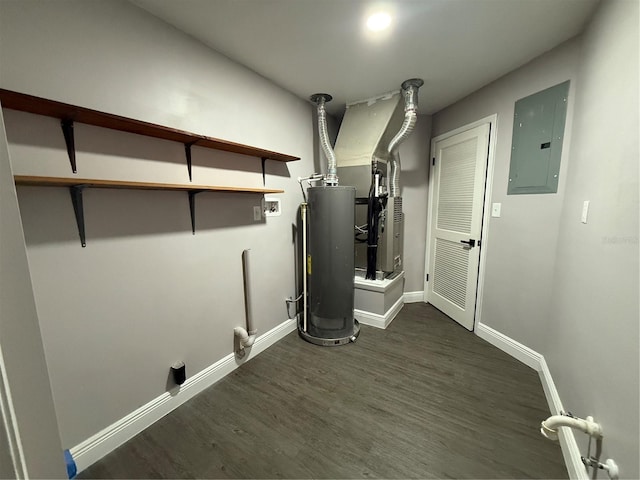 laundry room with dark wood-type flooring, gas water heater, electric dryer hookup, and electric panel