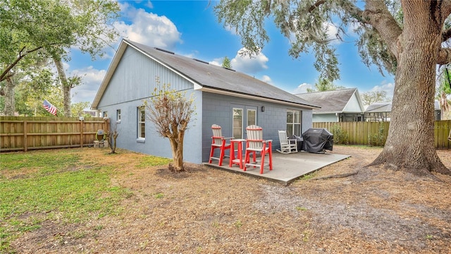 back of house featuring a patio area and french doors