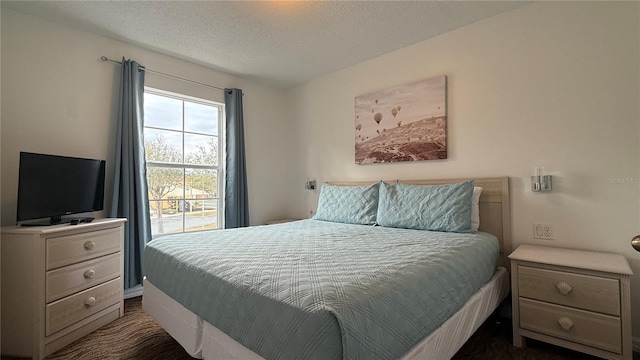 bedroom with a textured ceiling