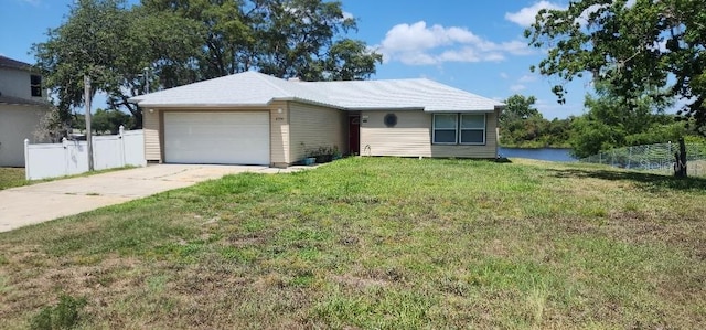 ranch-style house with a front lawn and a garage