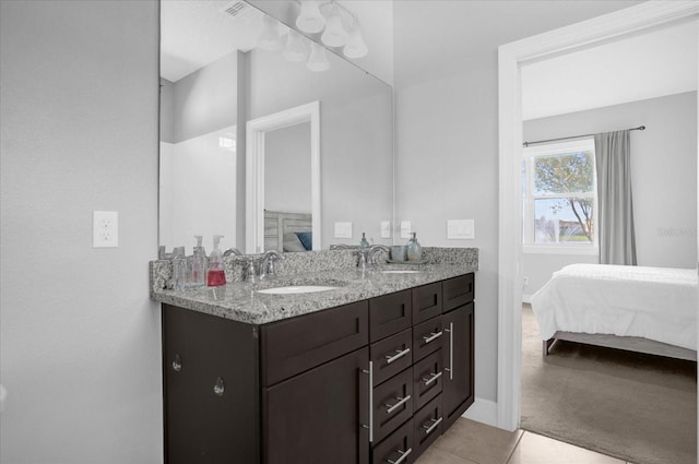 bathroom featuring vanity and tile patterned floors