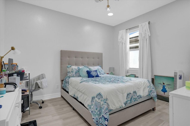 bedroom with light hardwood / wood-style flooring