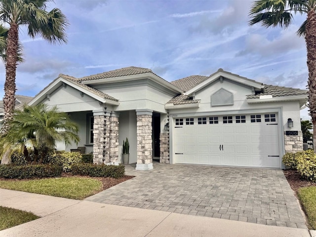 view of front of property featuring a garage