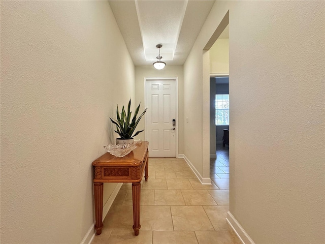 entryway featuring light tile patterned floors