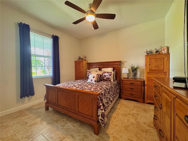 bedroom featuring ceiling fan