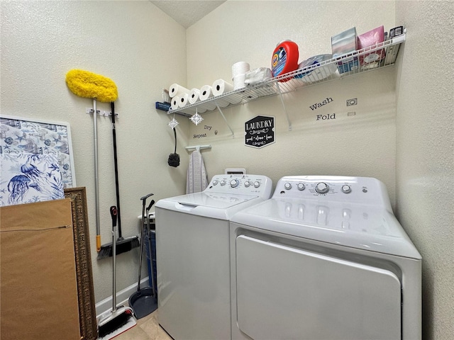 laundry room with washer and clothes dryer