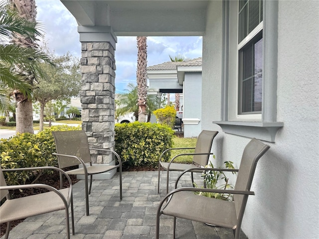 balcony with a patio area