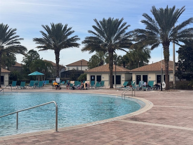 view of swimming pool featuring a patio