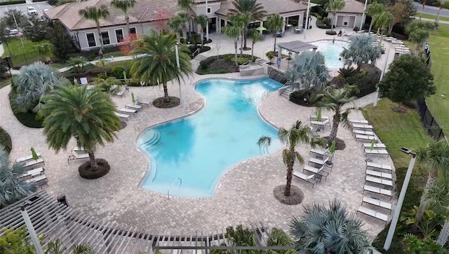 view of swimming pool with a patio area