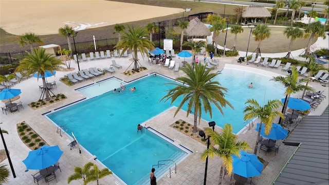 view of swimming pool with a patio