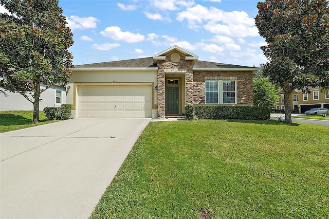 view of front of property featuring a front yard and a garage