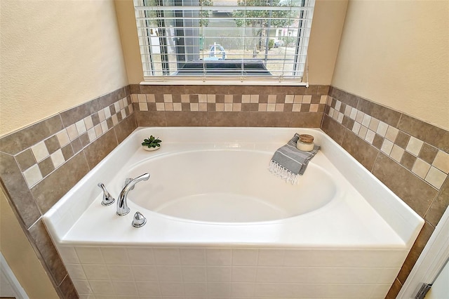 bathroom with a washtub