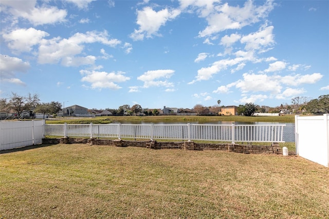 view of yard with a water view