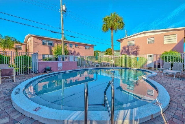 view of pool featuring a patio