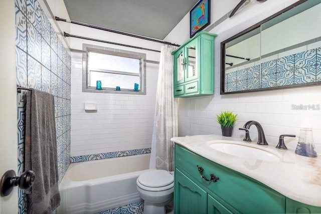 full bathroom featuring vanity, toilet, and shower / bath combo with shower curtain