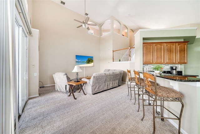 interior space featuring ceiling fan and lofted ceiling