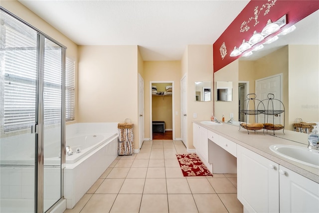 bathroom featuring vanity, tile patterned floors, and independent shower and bath