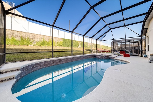 view of swimming pool featuring an in ground hot tub, a patio, a lanai, and a lawn