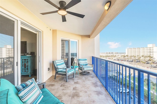 balcony featuring ceiling fan