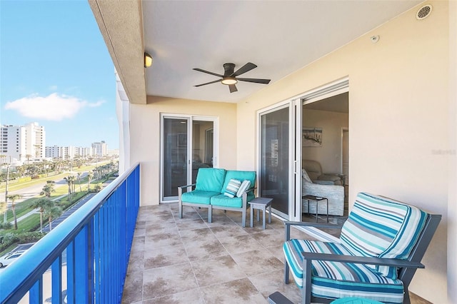 balcony featuring ceiling fan