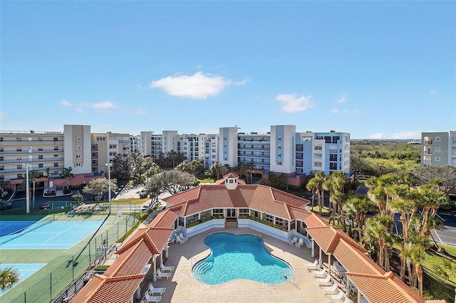 view of swimming pool featuring a patio area