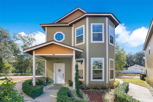 view of front of property with cooling unit