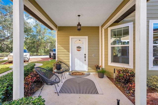 property entrance with a porch