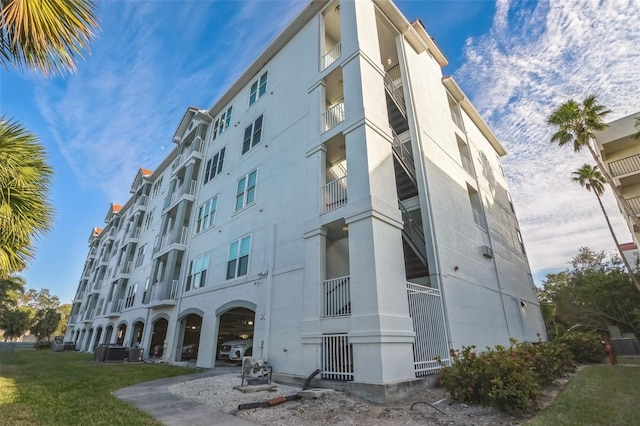 view of building exterior with cooling unit