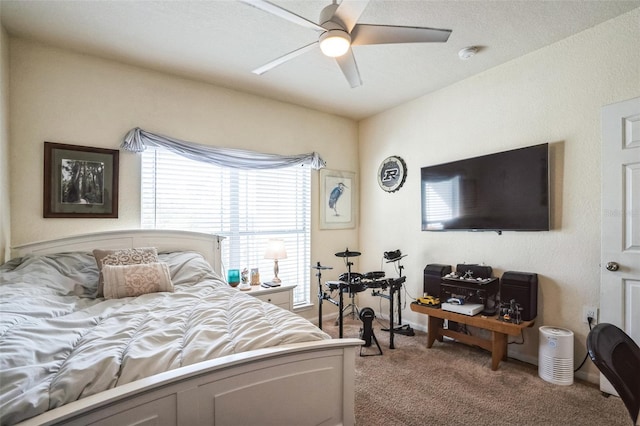 bedroom with ceiling fan and light colored carpet