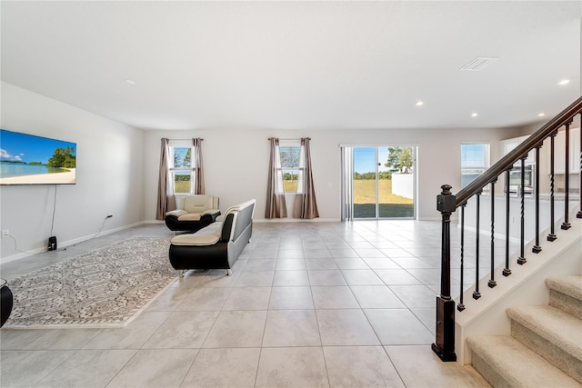 living area featuring light tile patterned floors