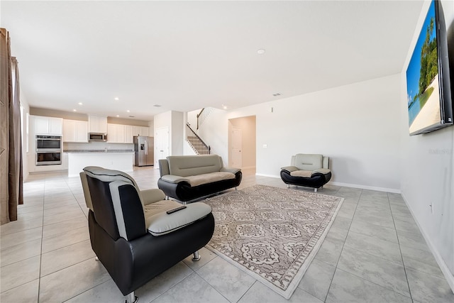 living room featuring light tile patterned flooring