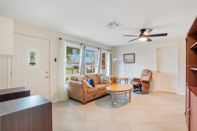 living room featuring ceiling fan