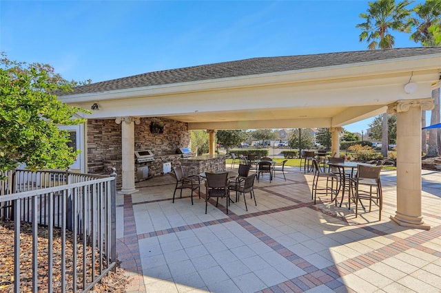 view of patio featuring a gazebo and area for grilling