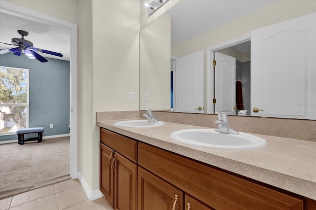 bathroom featuring vanity, tile patterned floors, and ceiling fan