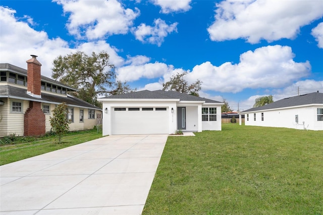 view of front of house featuring a front lawn and a garage