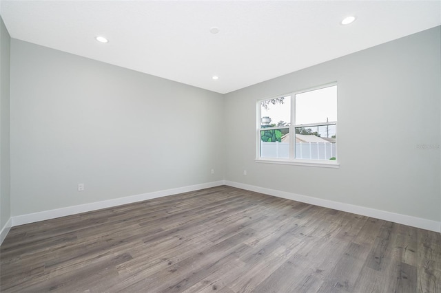 unfurnished room featuring wood-type flooring