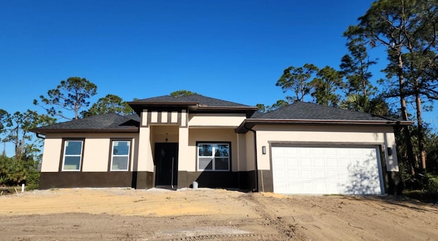 prairie-style house with a garage