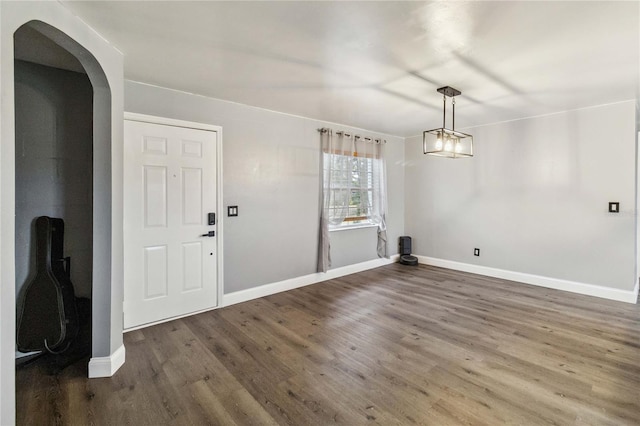 foyer entrance featuring dark hardwood / wood-style flooring