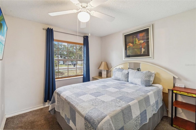 bedroom with carpet floors, a textured ceiling, and ceiling fan