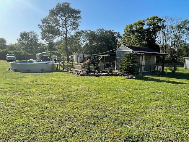 view of yard featuring a storage unit